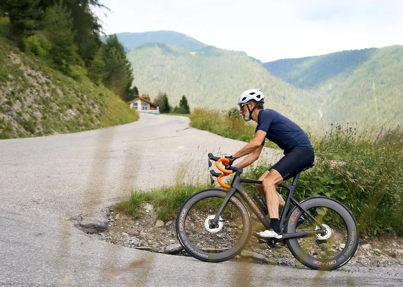 Cyclist riding a Vélobsessive custom road bike