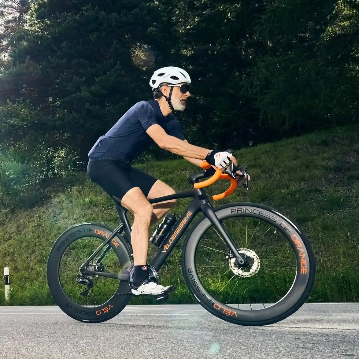 Cyclist riding a Vélobsessive road bike outdoors