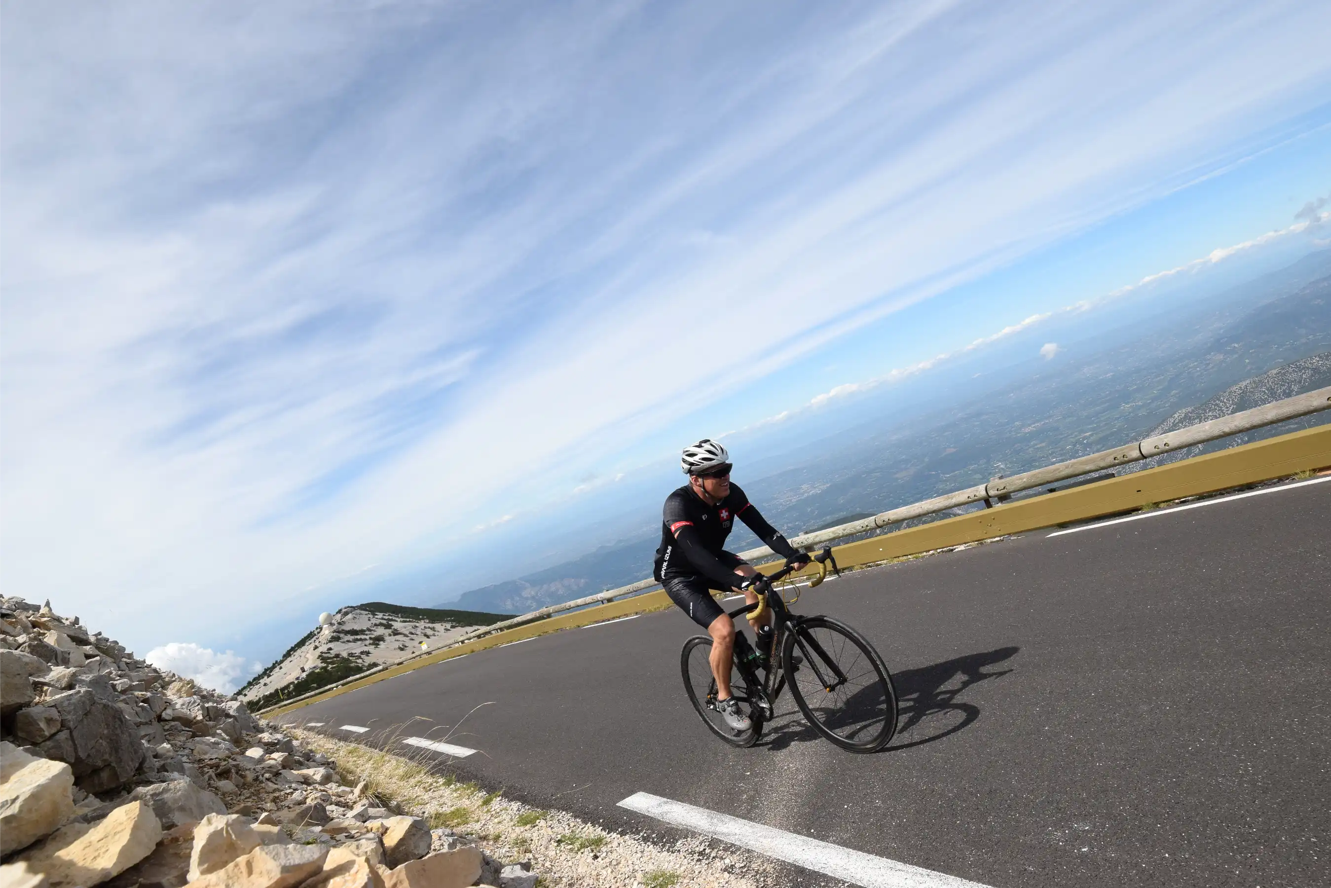 Road cyclist with a Vélobsessive bike in the mountains