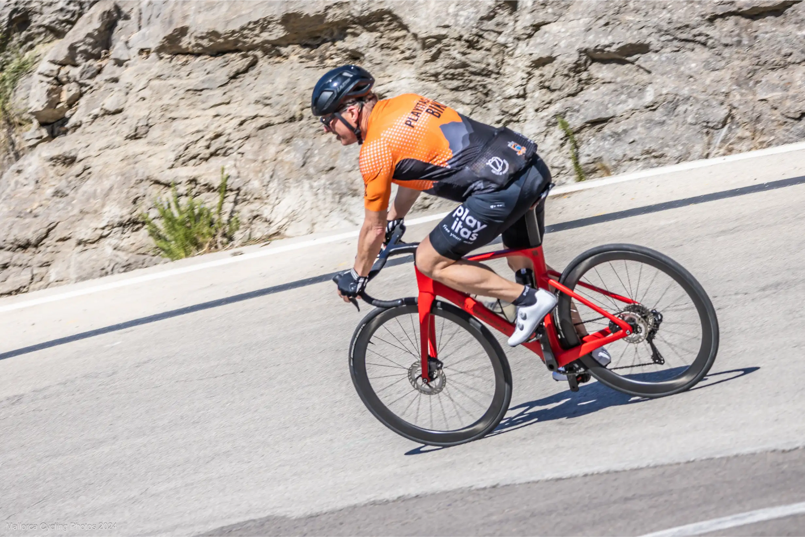 Cyclist on a Vélobsessive custom road bike