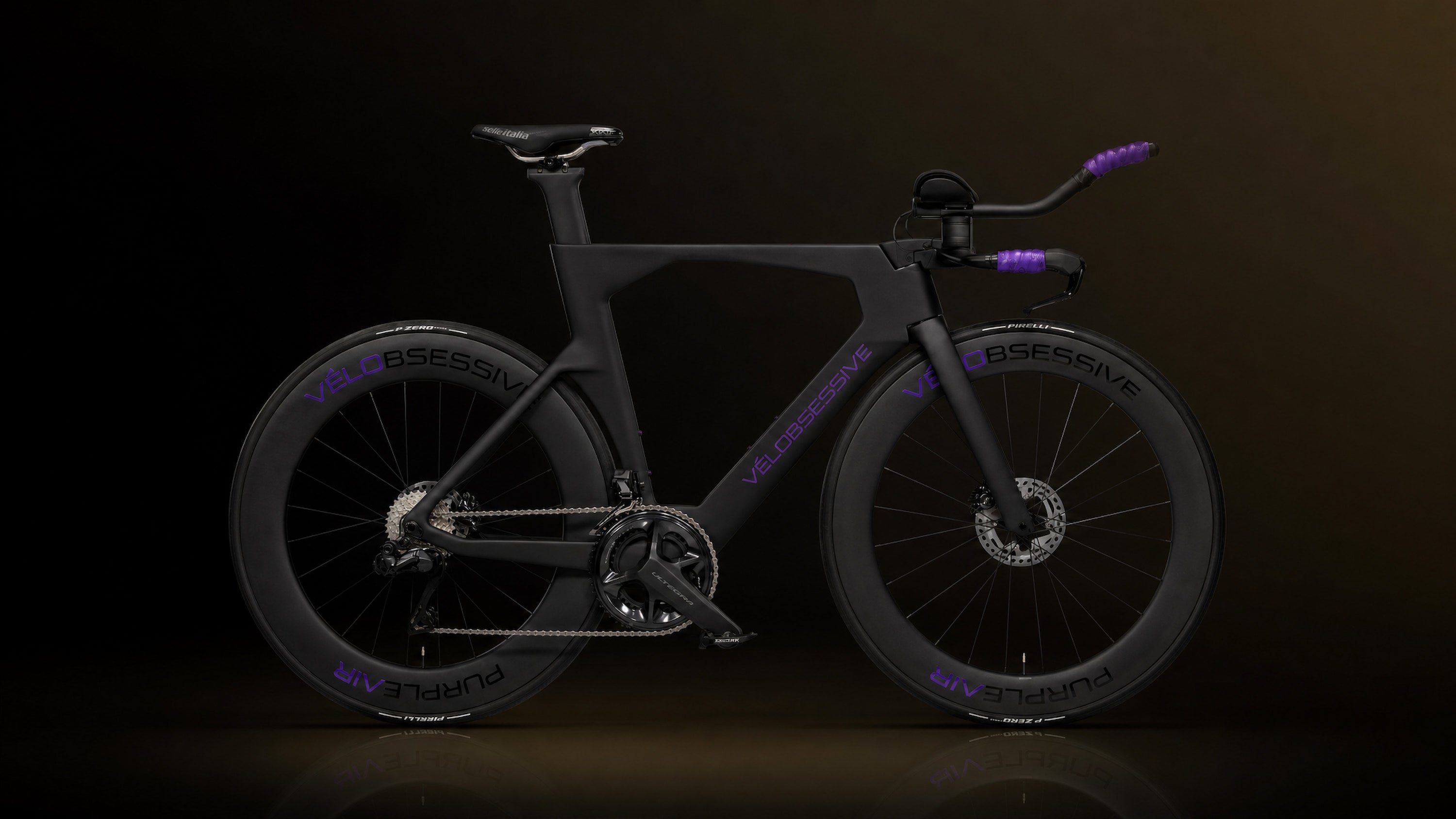 Horizontal Image of Vélobsessives Purple Air Triathlon Bike on a Black background with subtle orange gradient.